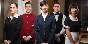 Hotel staff standing together and smiling